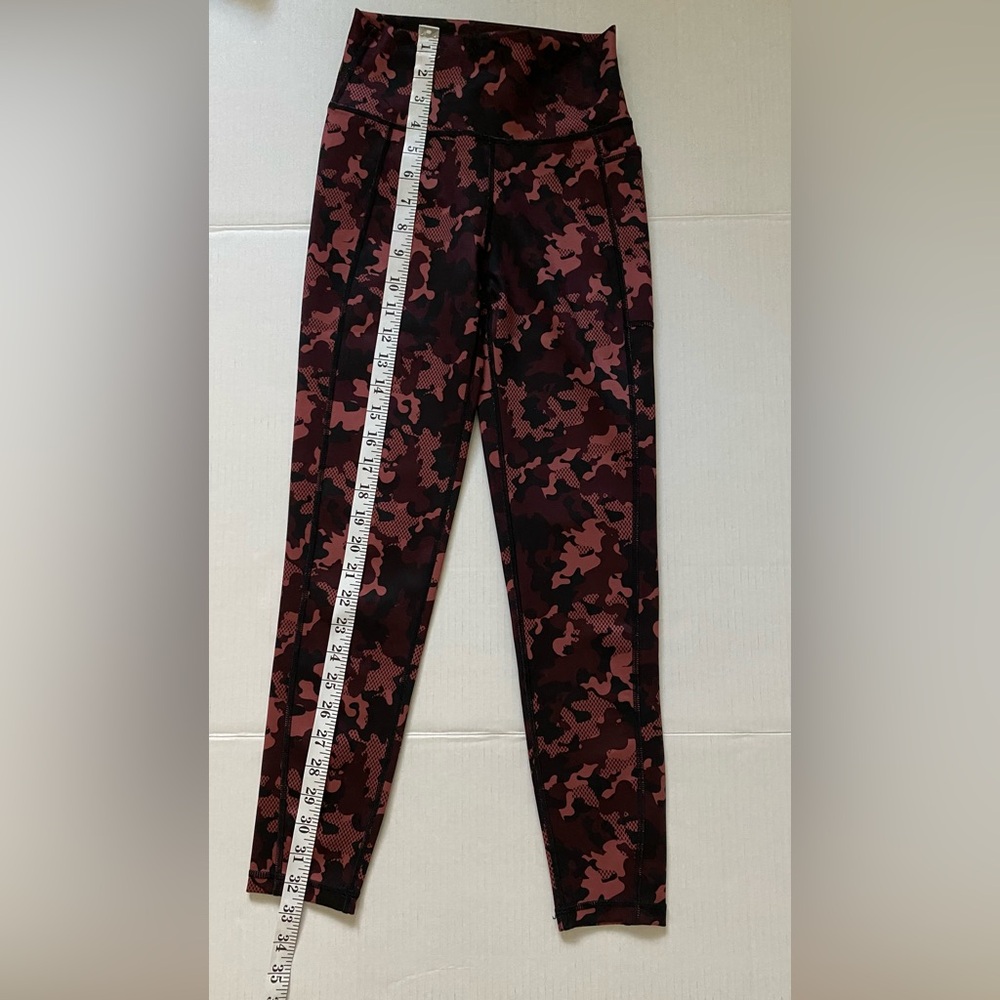 Sweaty Betty Women’s Soft & Stretchy Leggings size XS In red, maroon & Black.